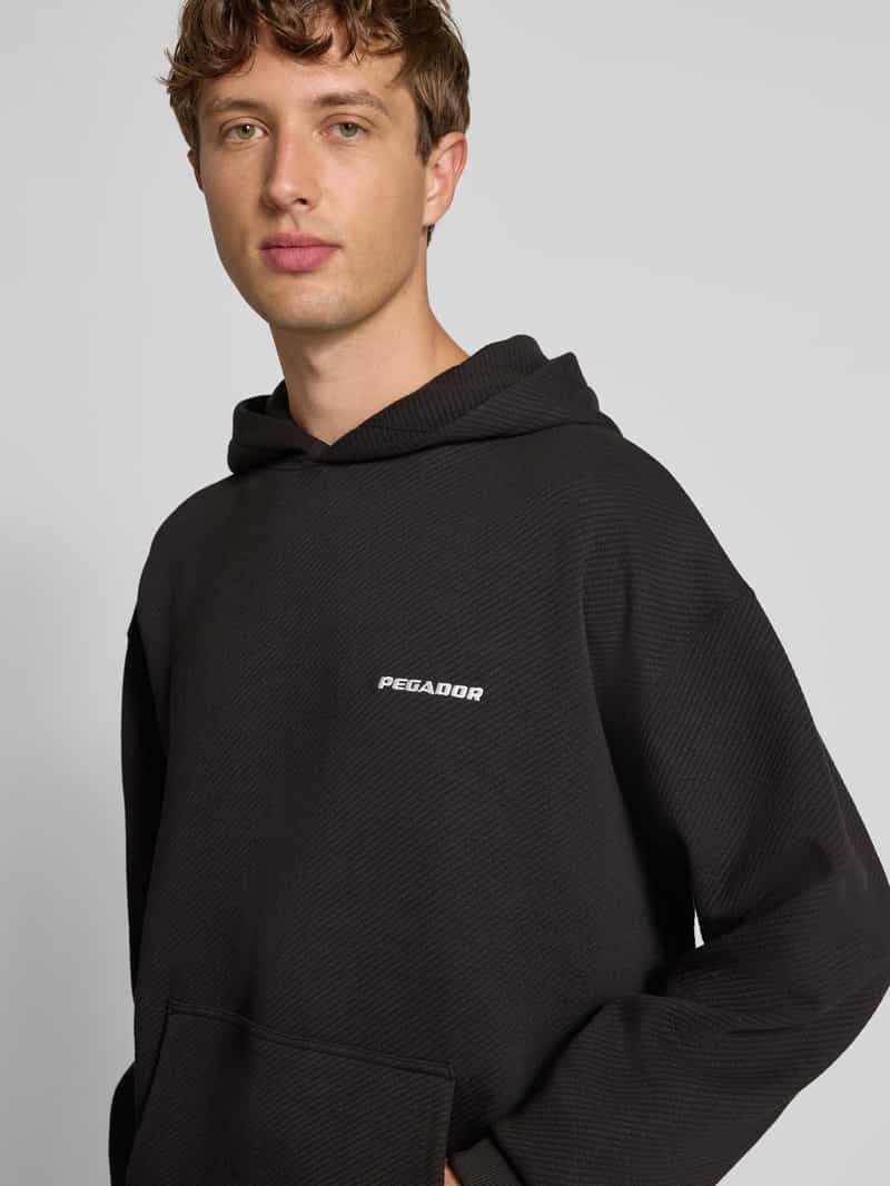 Pegador Oversized hoodie met logostitching en kangoeroezak