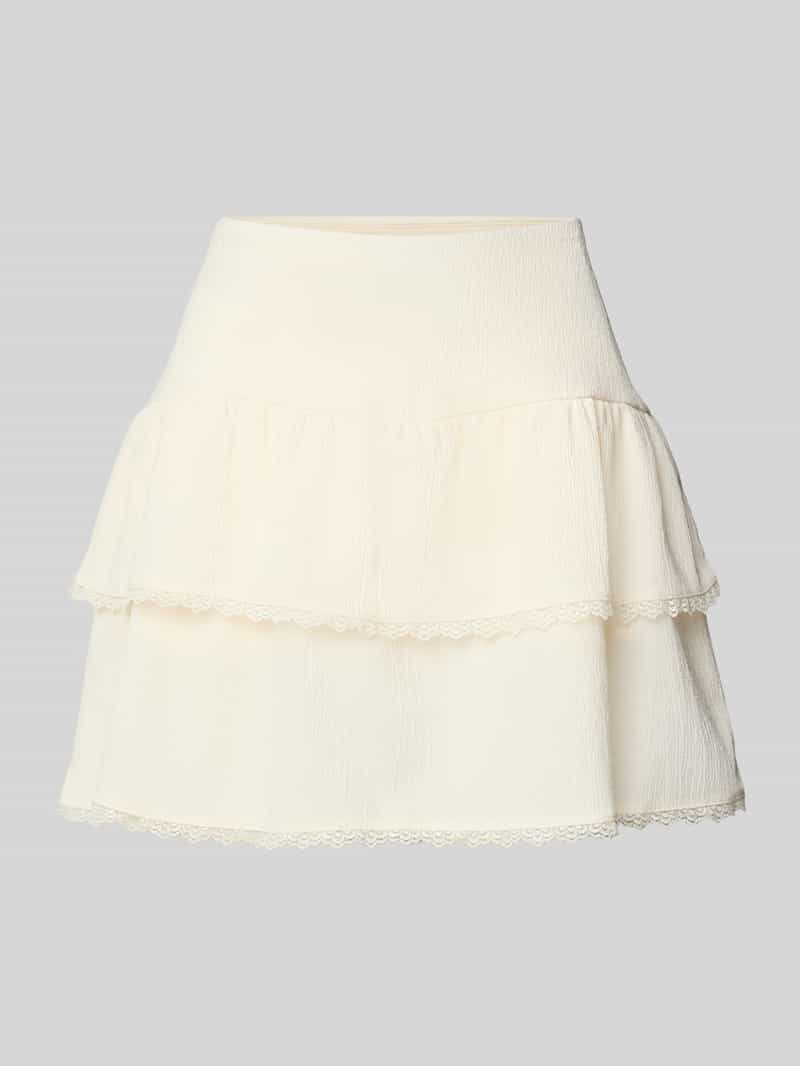 Review Minirok in laagjeslook met kant