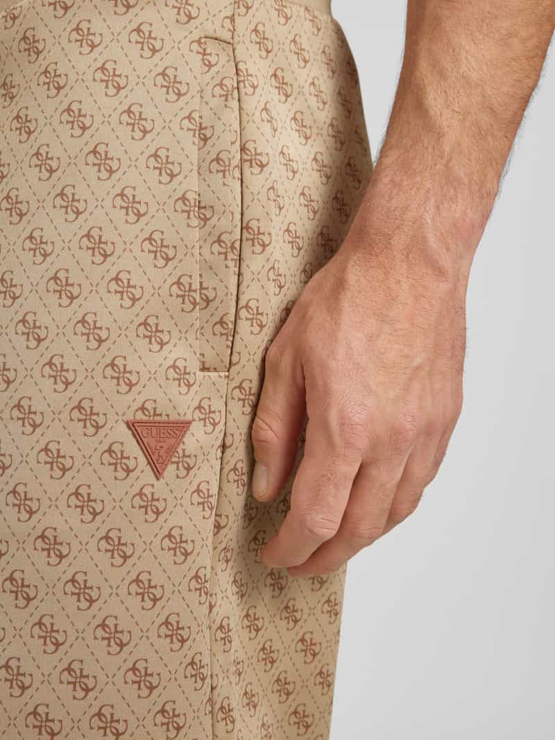 Guess Activewear Sweatshorts met all-over logoprint model 'KORBIN'