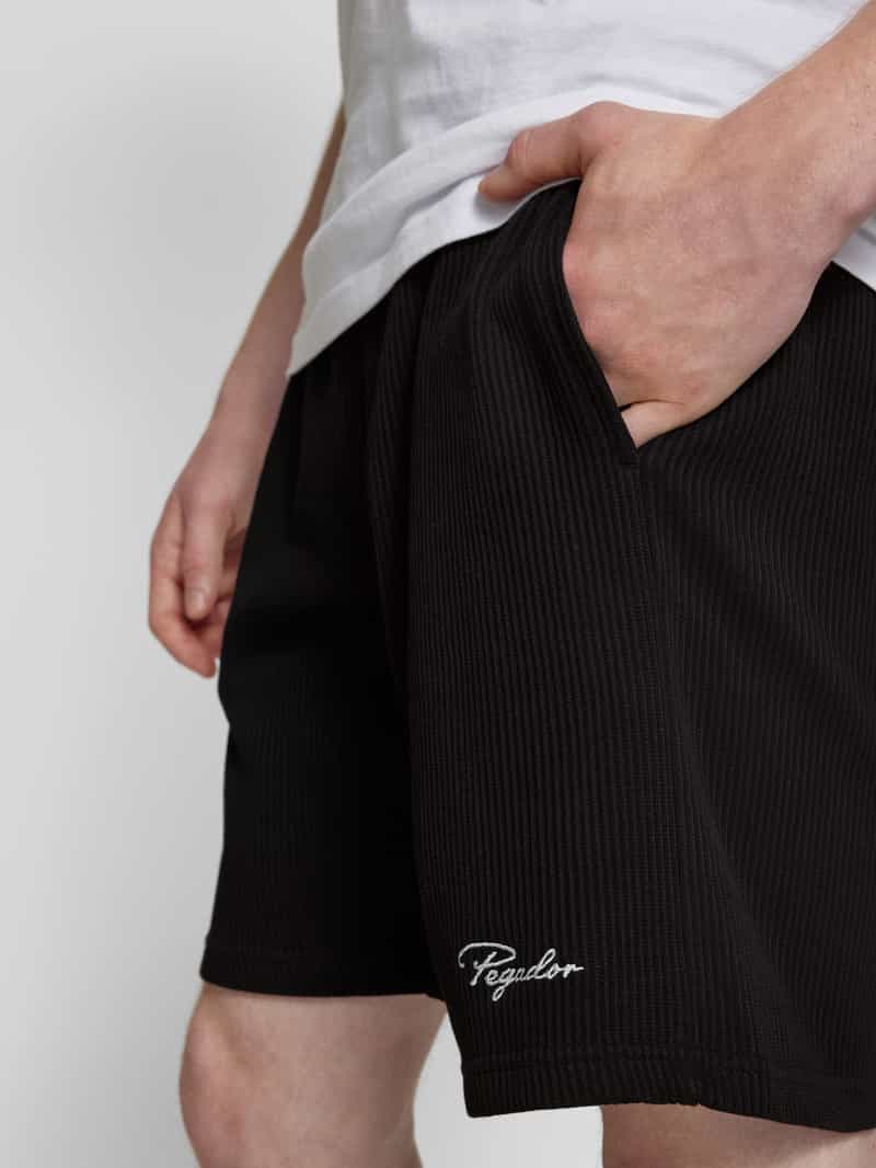 Pegador Sweatshorts met logostitching en steekzakken