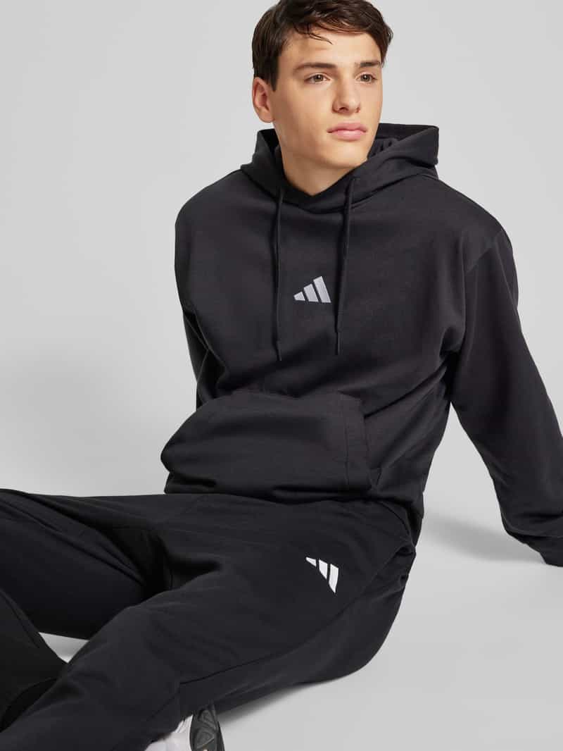 ADIDAS SPORTSWEAR Hoodie met logostitching model 'FEELCOZY'
