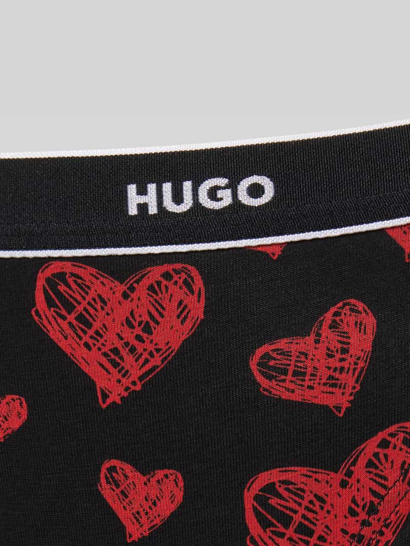 HUGO String met label in band model 'TRIPLET'