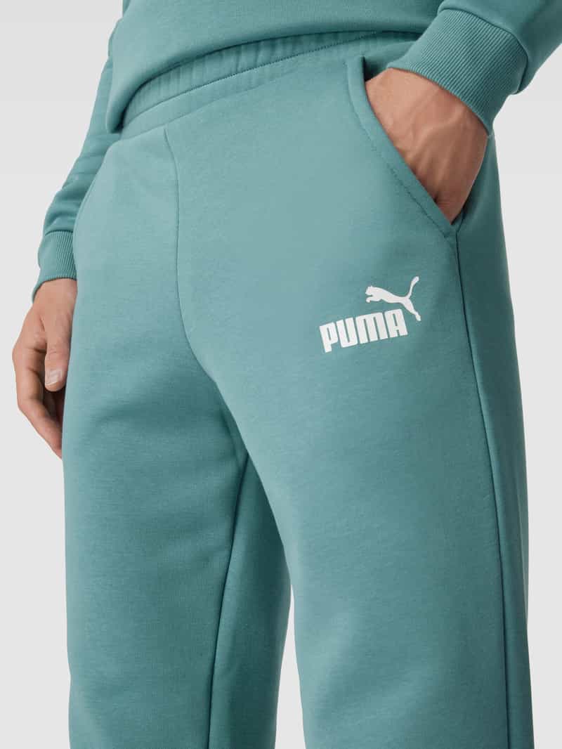 PUMA PERFORMANCE Sweatpants met labelprint