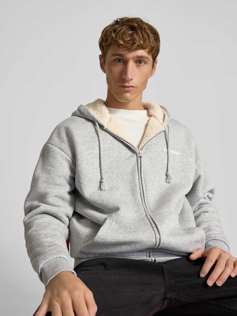 REVIEW Sweatjack met capuchon