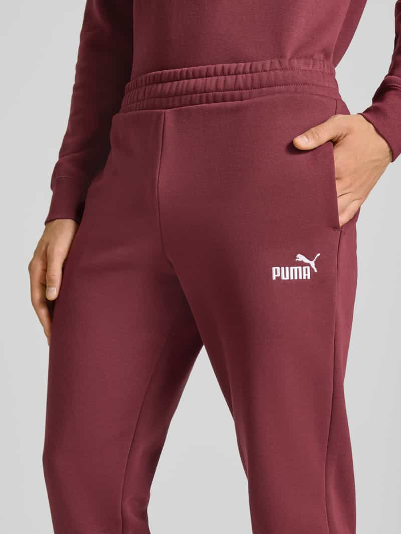 PUMA PERFORMANCE Sweatpants met labelstitching en elastische band