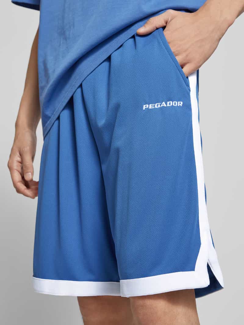 Pegador Loose fit korte basketbalbroek met labelstitching