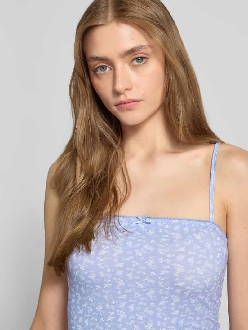 Review Korte top met sierstrik