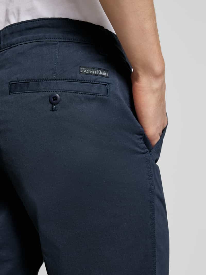 Calvin Klein Jeans Slim fit chino met steekzakken