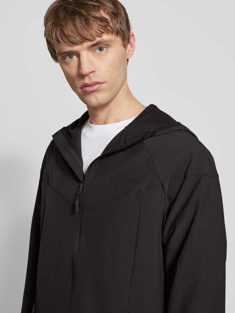 REVIEW Softshell-jack met labelprint