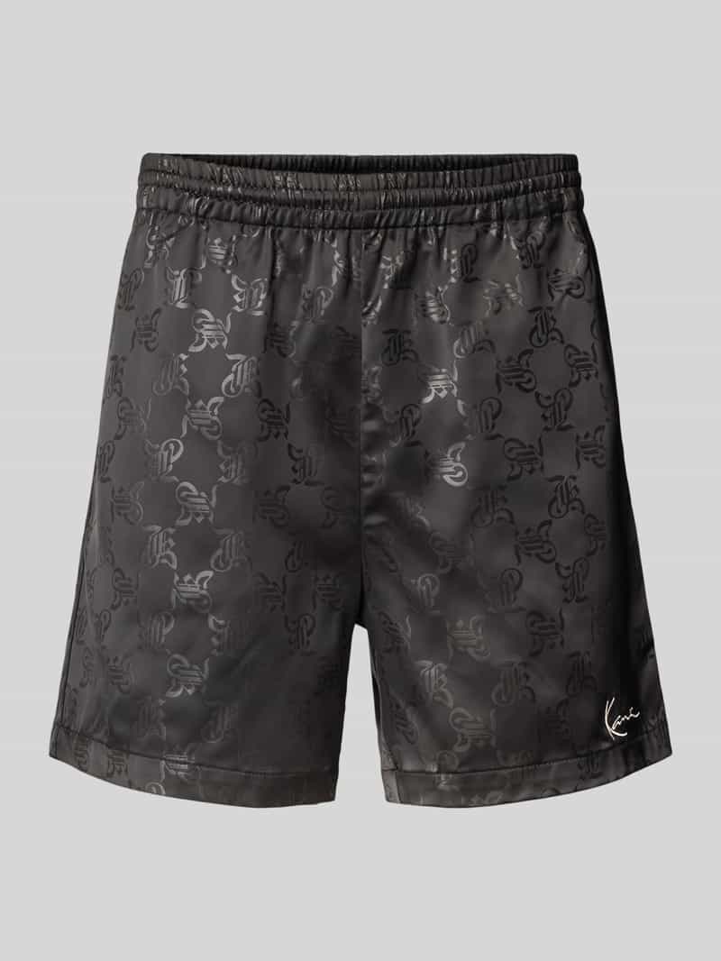 Karl Kani Relaxed fit korte broek met all-over logoprint model 'Signature'