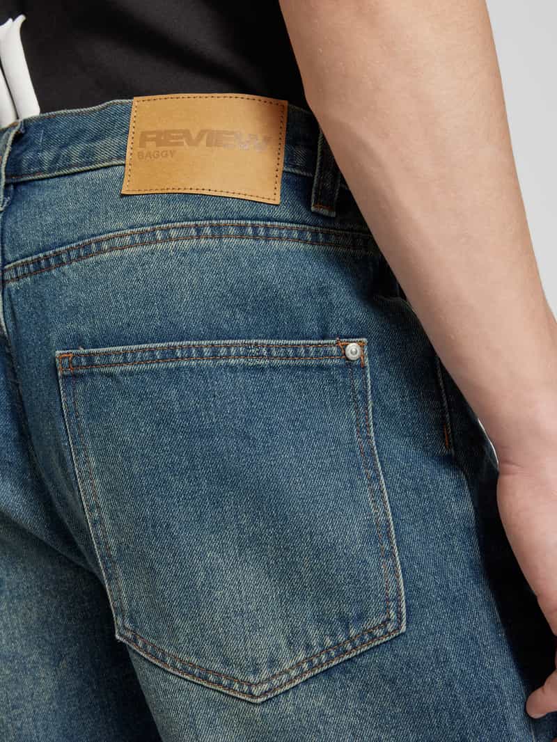 REVIEW Essentials baggy jeans met vintage wassing en tint