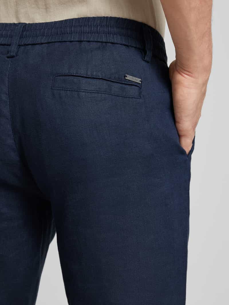 Spodnie o kroju tapered fit z lnu model ‘LOUIS’