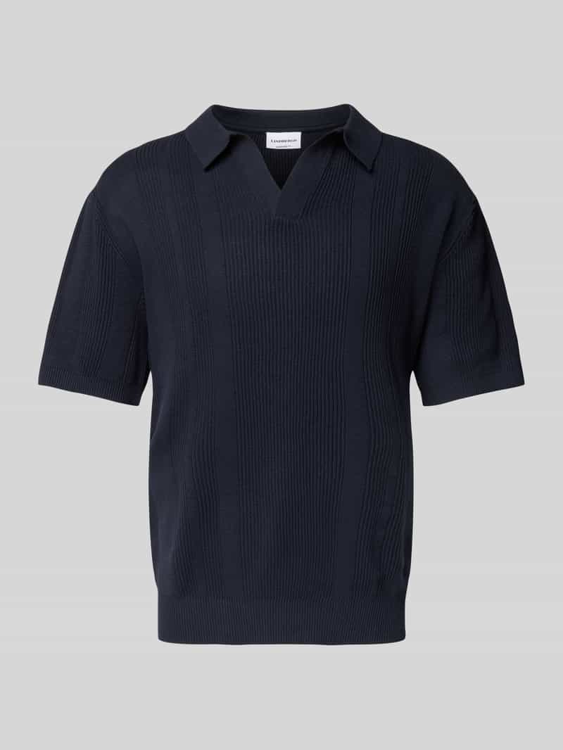 Oversized poloshirt met V-hals