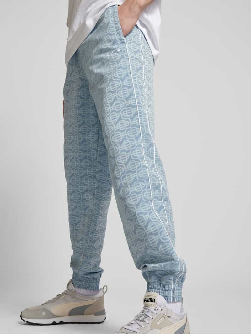 PUMA PERFORMANCE Sweatpants met all-over motief