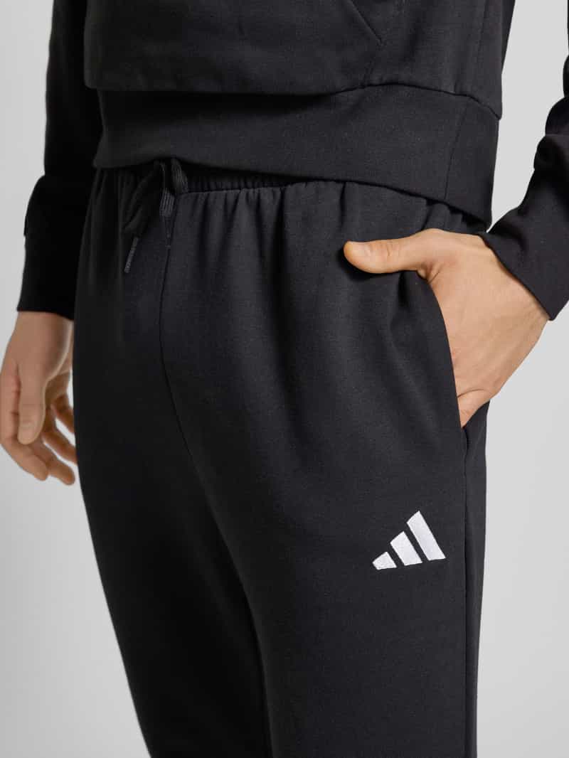 ADIDAS SPORTSWEAR Regular fit sweatpants met logostitching model 'FEELCOZY'
