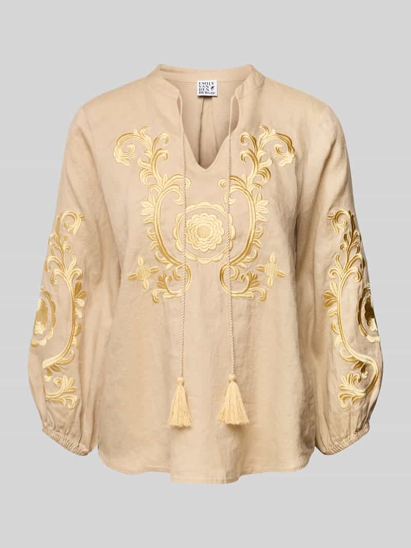 Linnen blouse met motiefstitching en kwasten