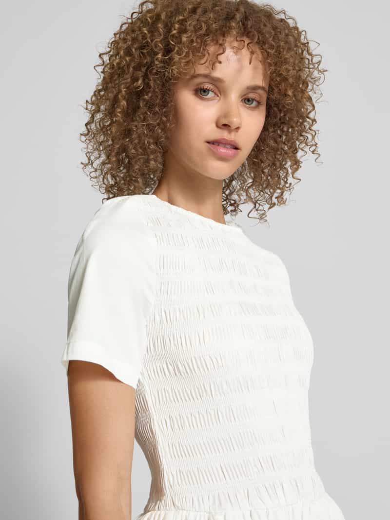 Amy Lynn Cocktailjurk met smokdetails model 'Eleonor'