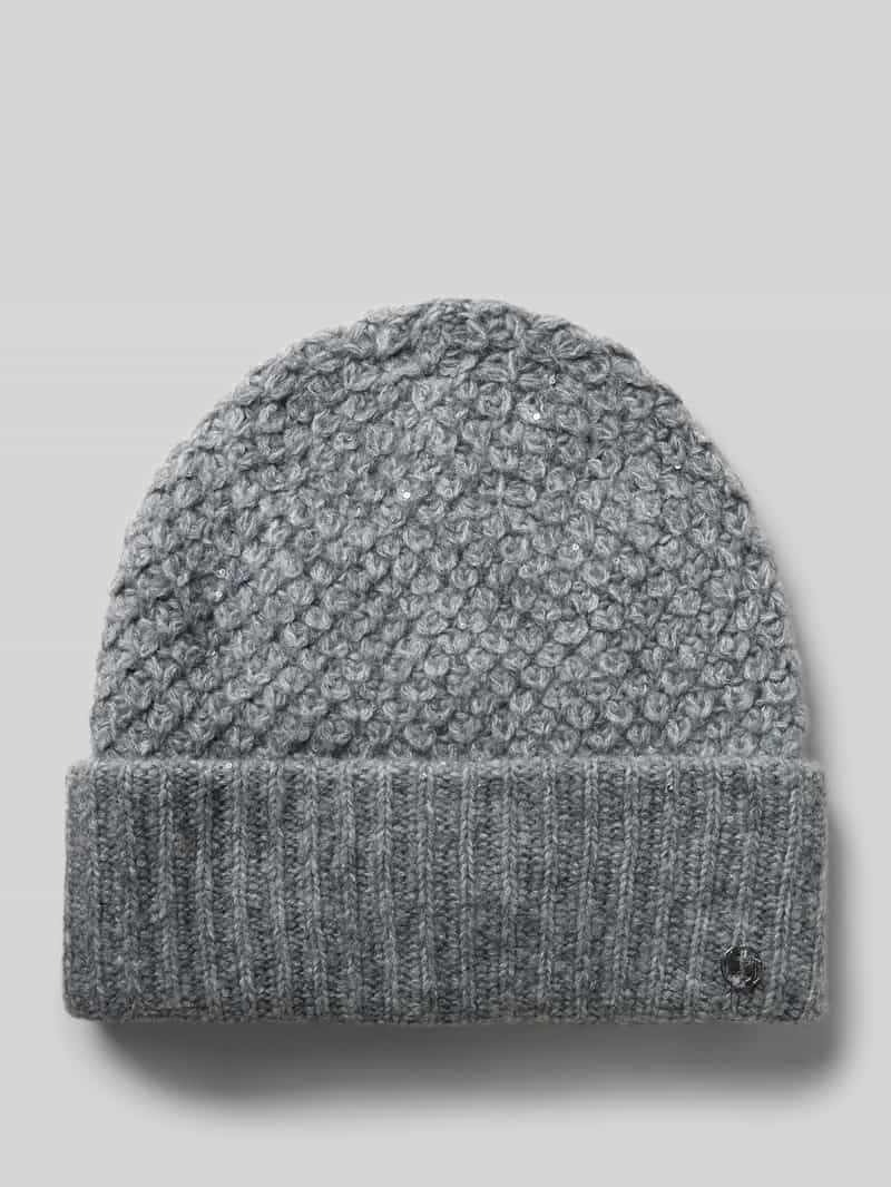 comma Muts met omslag en labeldetail