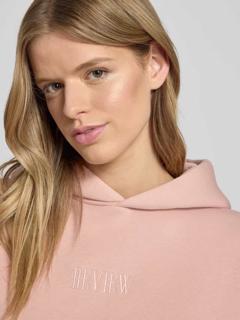Review Hoodie met labelstitching en kangoeroezak