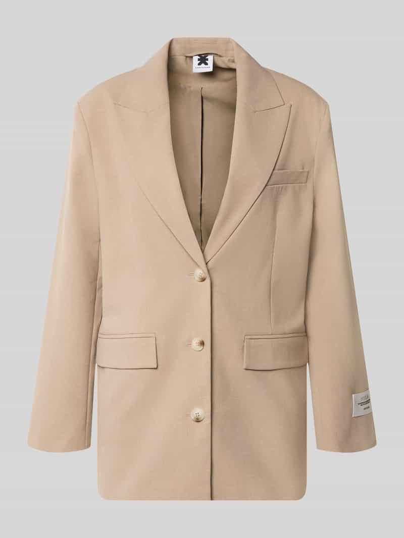 Karo Kauer Oversized lange blazer met labelpatch rug