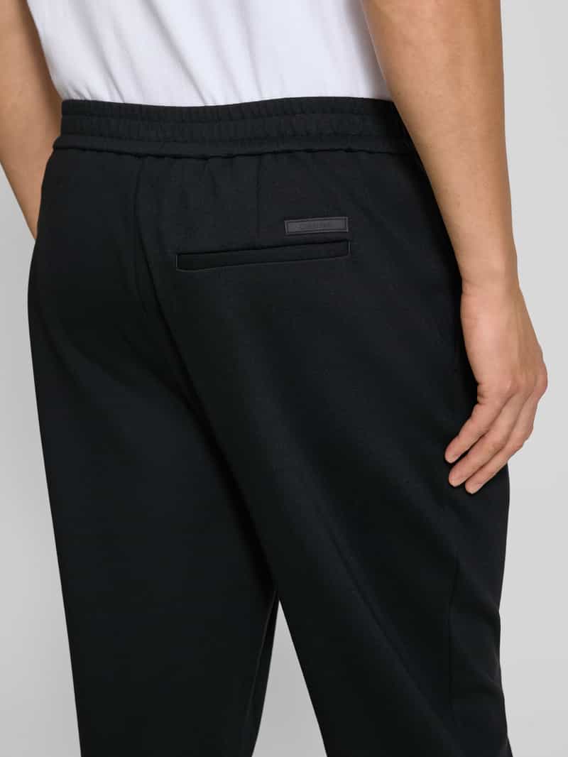 CK Calvin Klein Slim tapered fit stoffen broek met bandplooien
