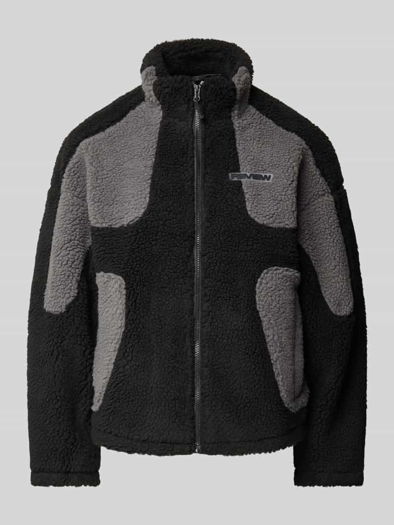 Review Sherpa jacket met labelpatch