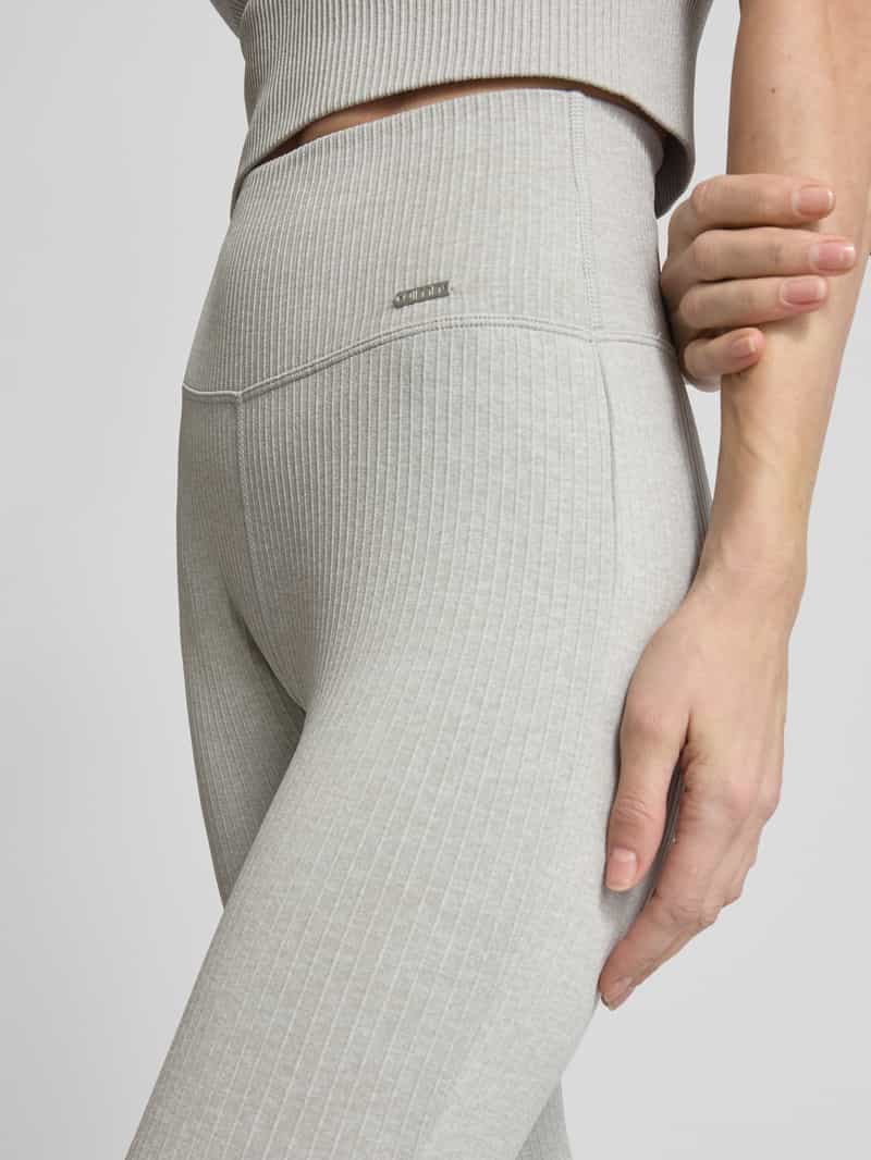 AIMN Flared legging met labeldetail