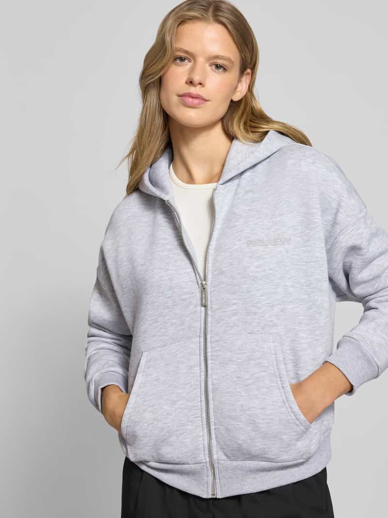 Review Oversized sweatjack met capuchon