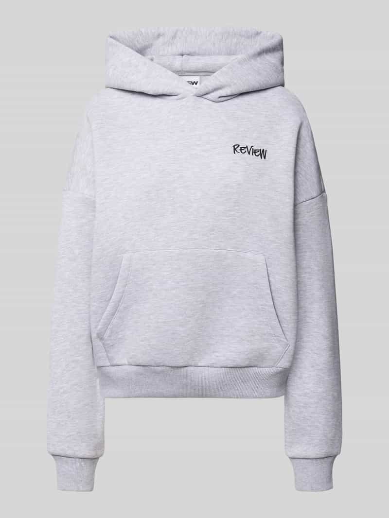 Review Oversized hoodie met labelprint
