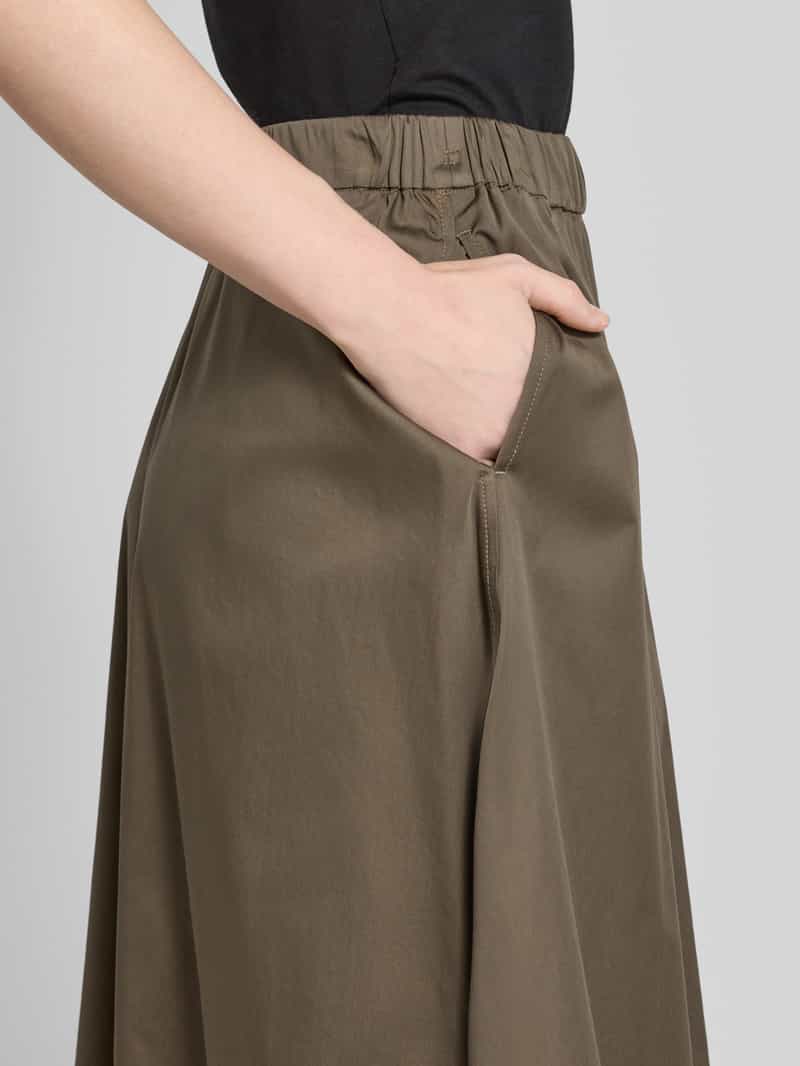 comma Midirok met elastische band