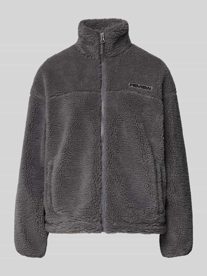 Review Fleecejack met opstaande kraag en labeldetail