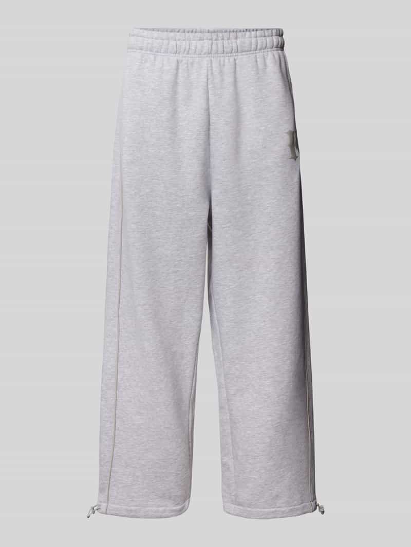 Karl Kani Wide leg sweatpants met labelprint