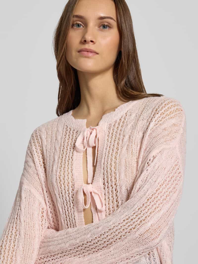 Review Gebreide cardigan met ajourpatroon