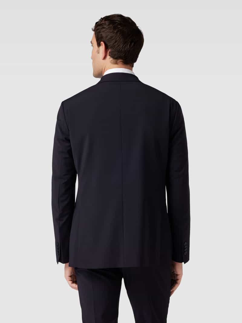 -knoops colbert met klepzakken en speld Roy Robson