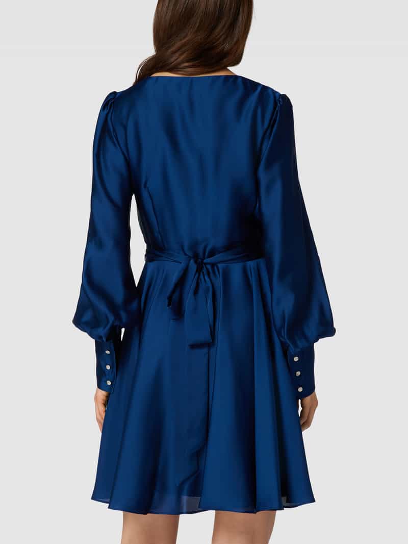 Cocktailjurk in wikkellook Swing