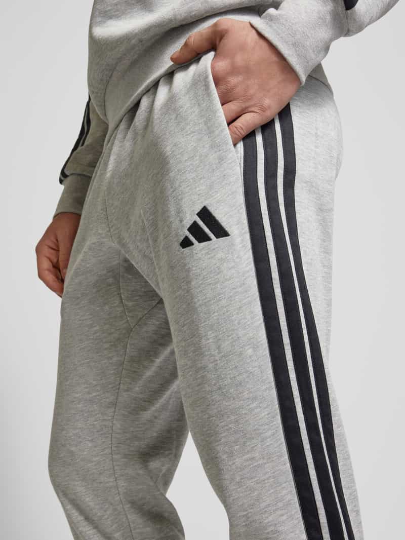 ADIDAS SPORTSWEAR Relaxed fit sweatpants met logostitching