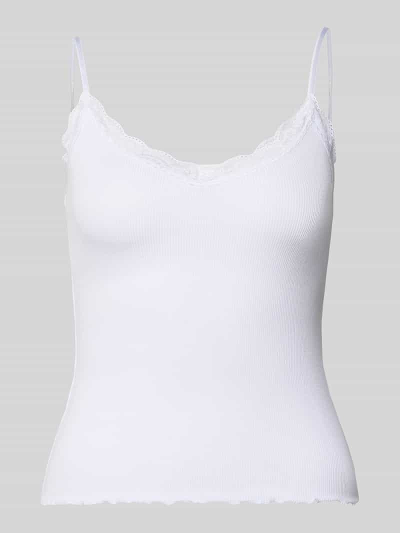 slim fit top van viscosemix met kant