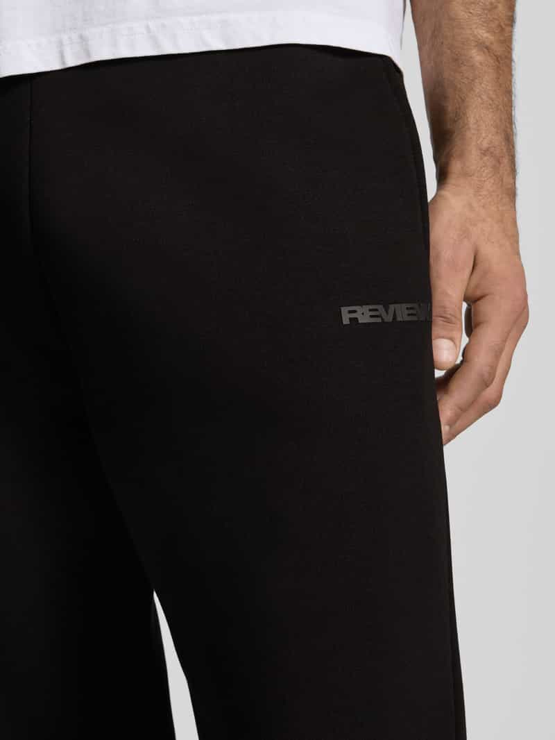 REVIEW Loose fit sweatpants met zijzakken
