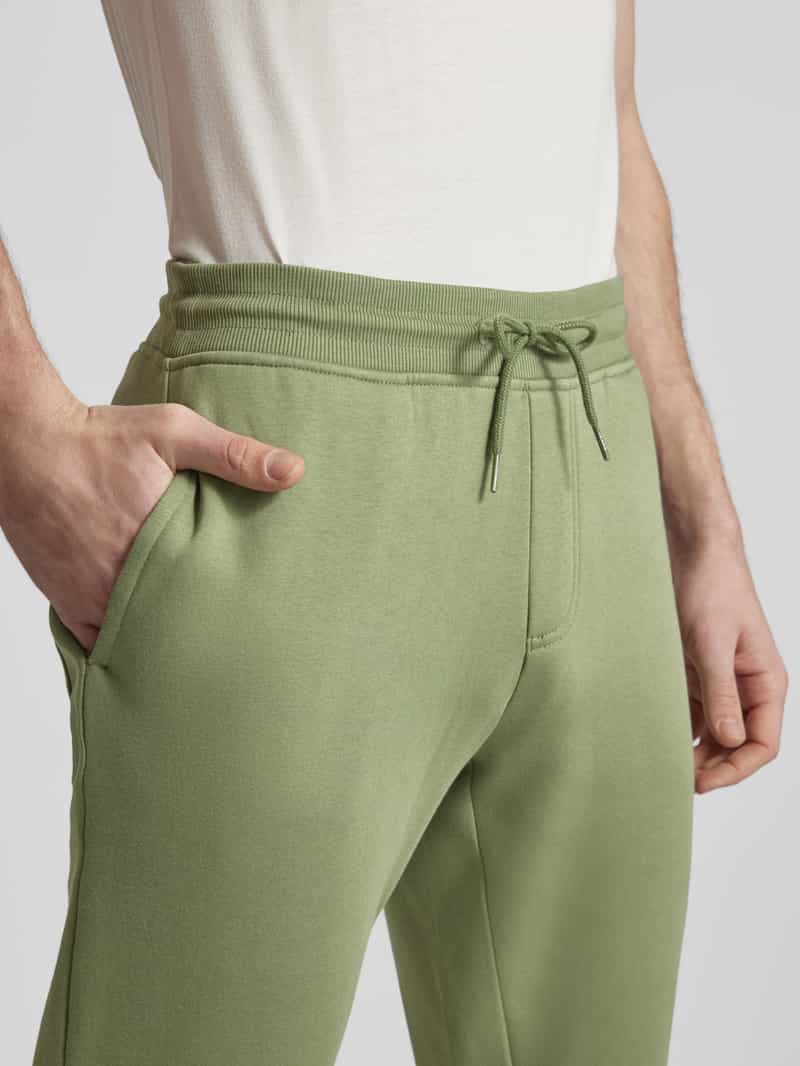 Tommy Jeans Slim fit sweatpants met gestileerde opening