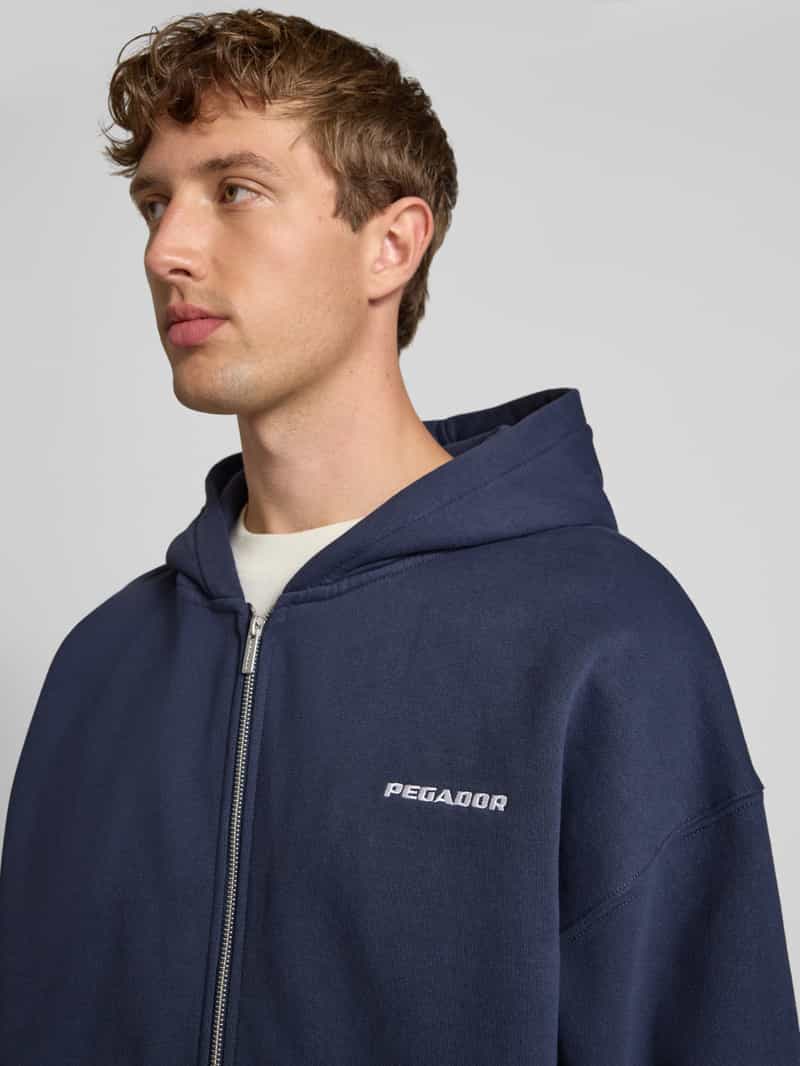 Pegador Oversized sweatjack met logostitching en capuchon