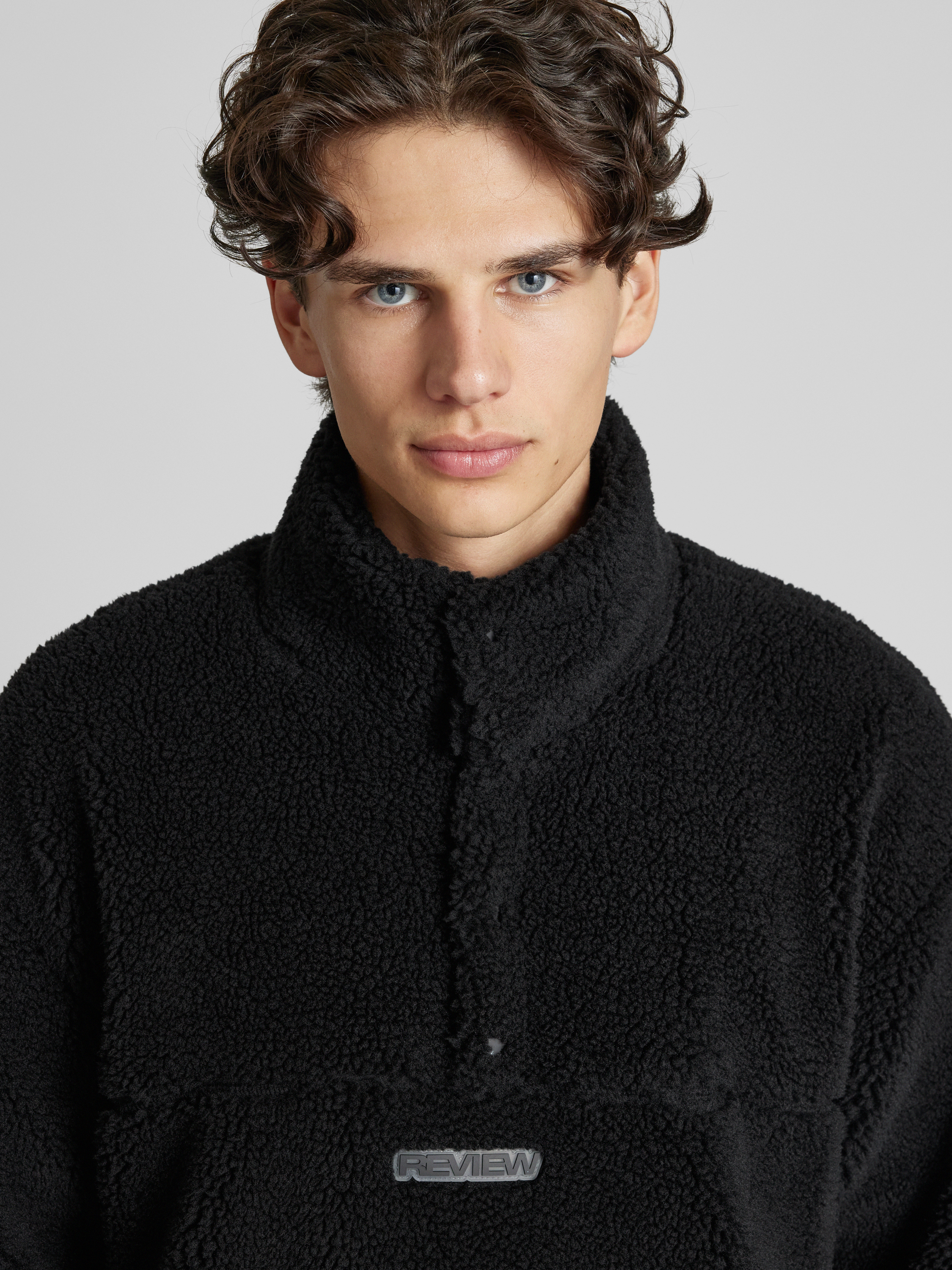 REVIEW Sherpa jacket met labelpatch