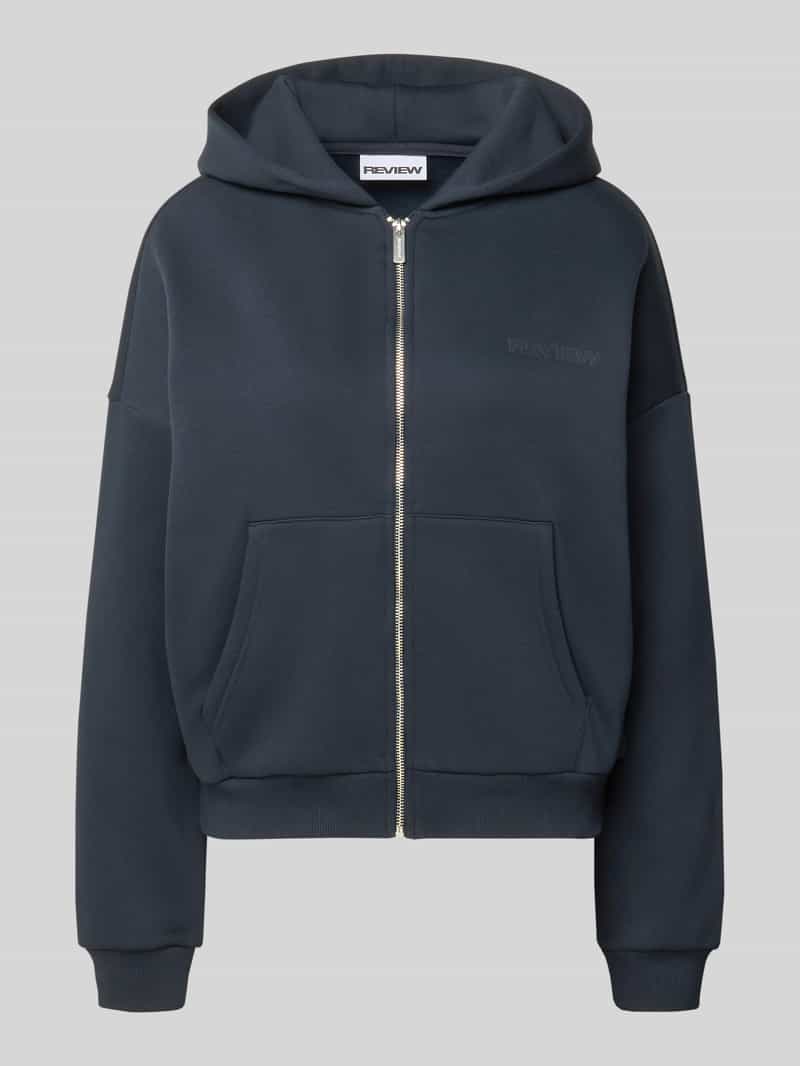 Review Oversized sweatjack met capuchon