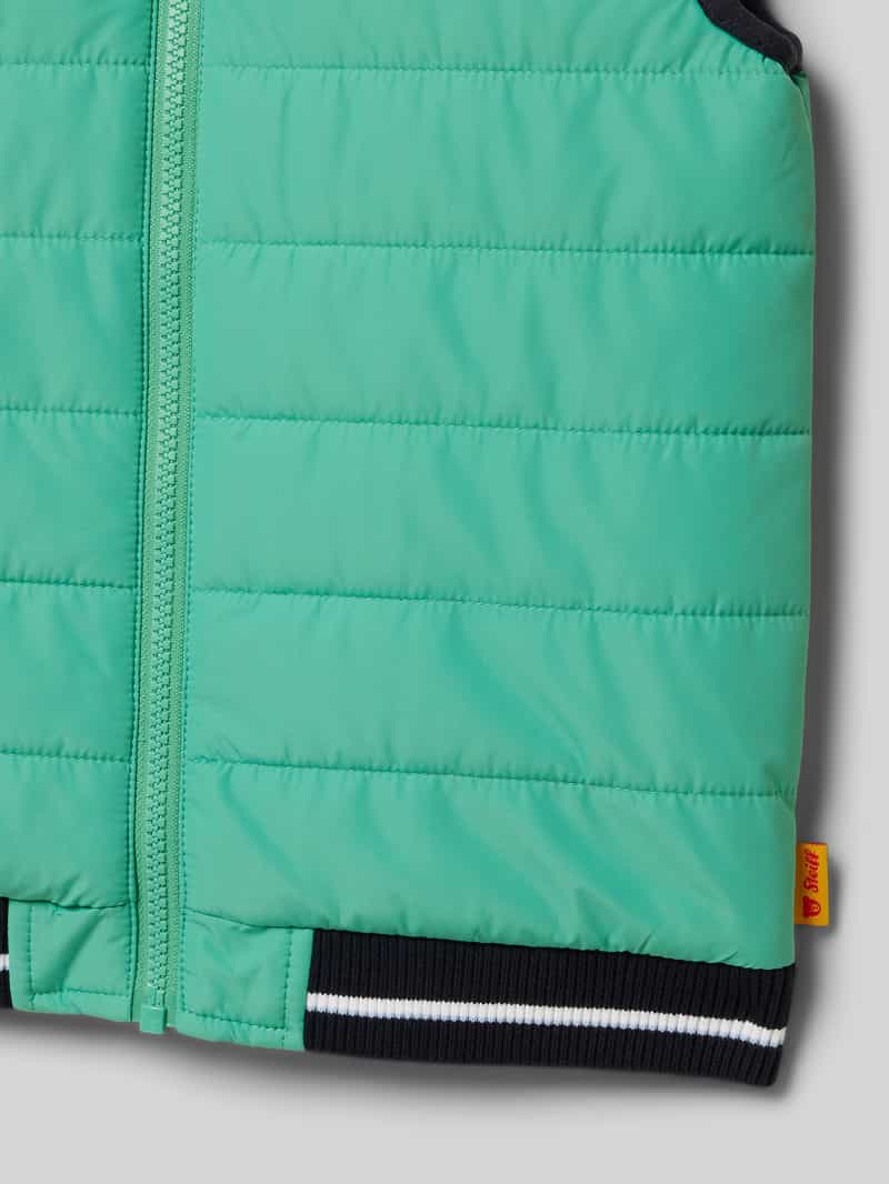 Steiff Bodywarmer met labeldetail
