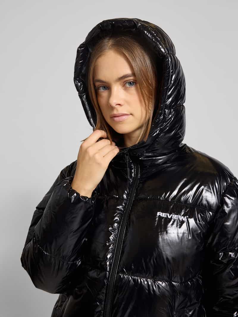 Review Gewatteerd jack met capuchon en labelstitching