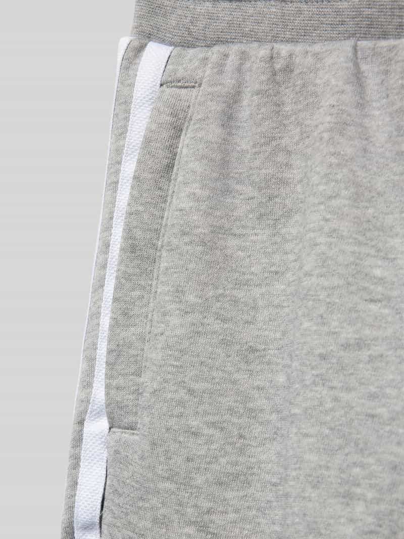 adidas Originals Regular fit sweatpants met labelstitching model 'TREFOIL'