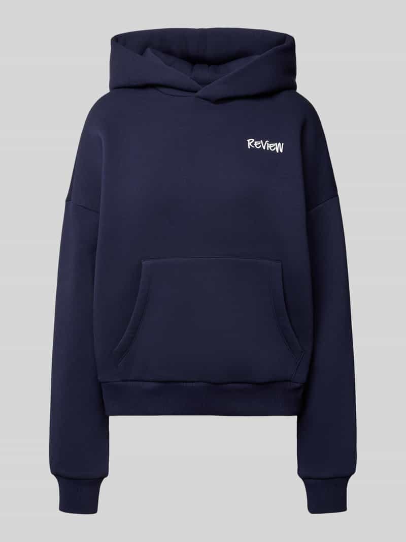 Review Oversized hoodie met labelprint