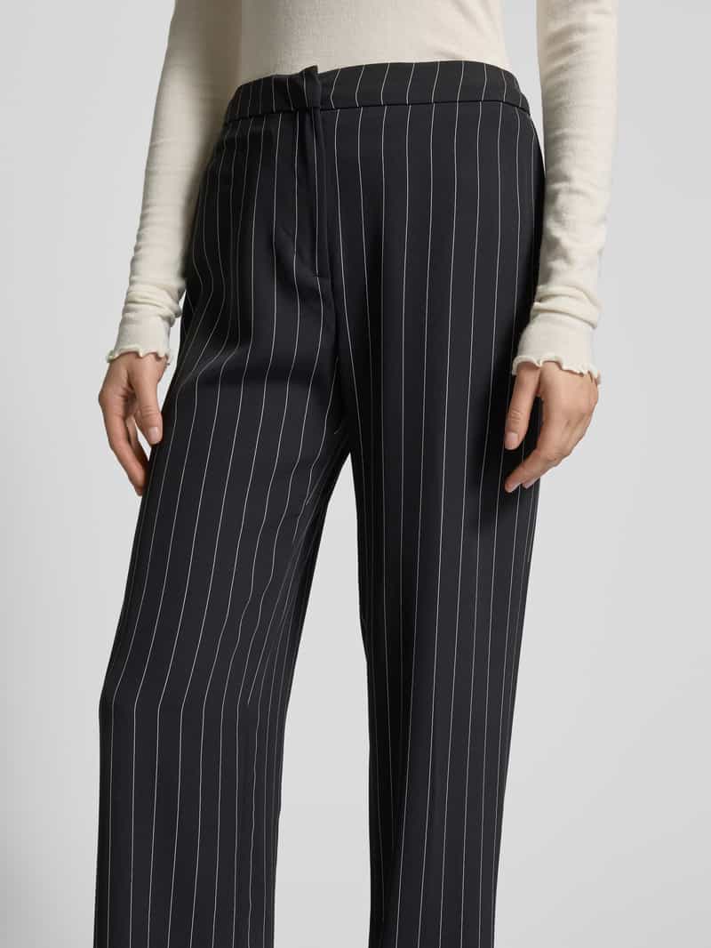 Review High waist stoffen broek met knoop haakjes- en ritssluiting