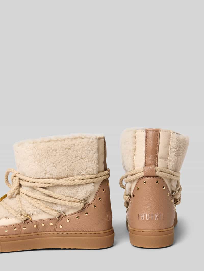 INUIKII Snowboots van leer met teddybont model 'CURLY ROCK'