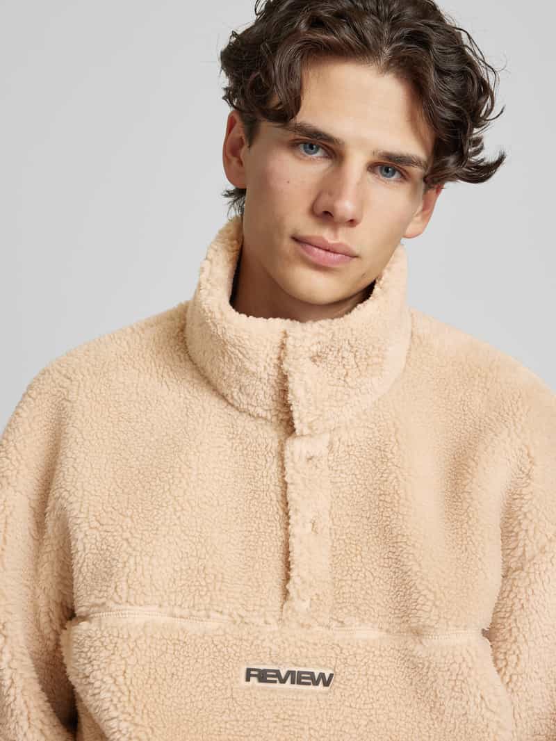 REVIEW Sherpa jacket met labelpatch