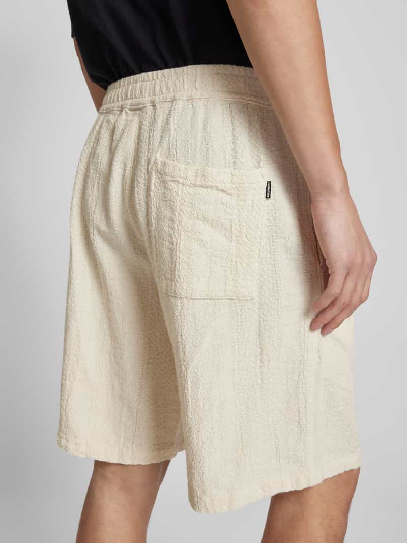 REVIEW Relaxed fit korte broek in kreuklook